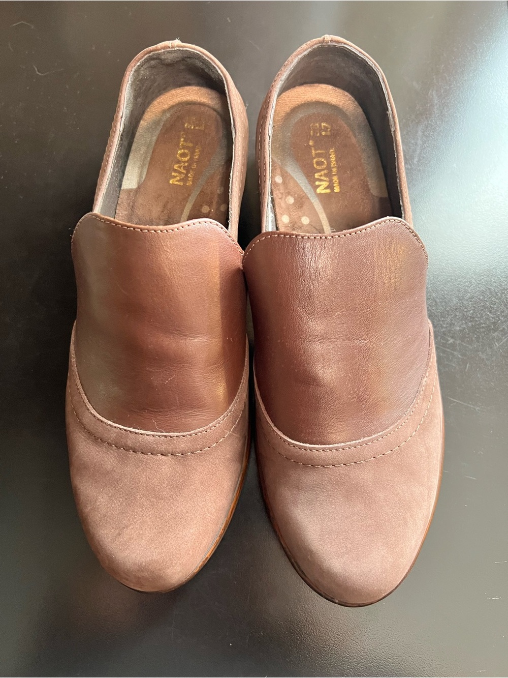 Naot Angin Slip on loafers size 38/7-7.5. Mixed brown leather and nubuck colors.